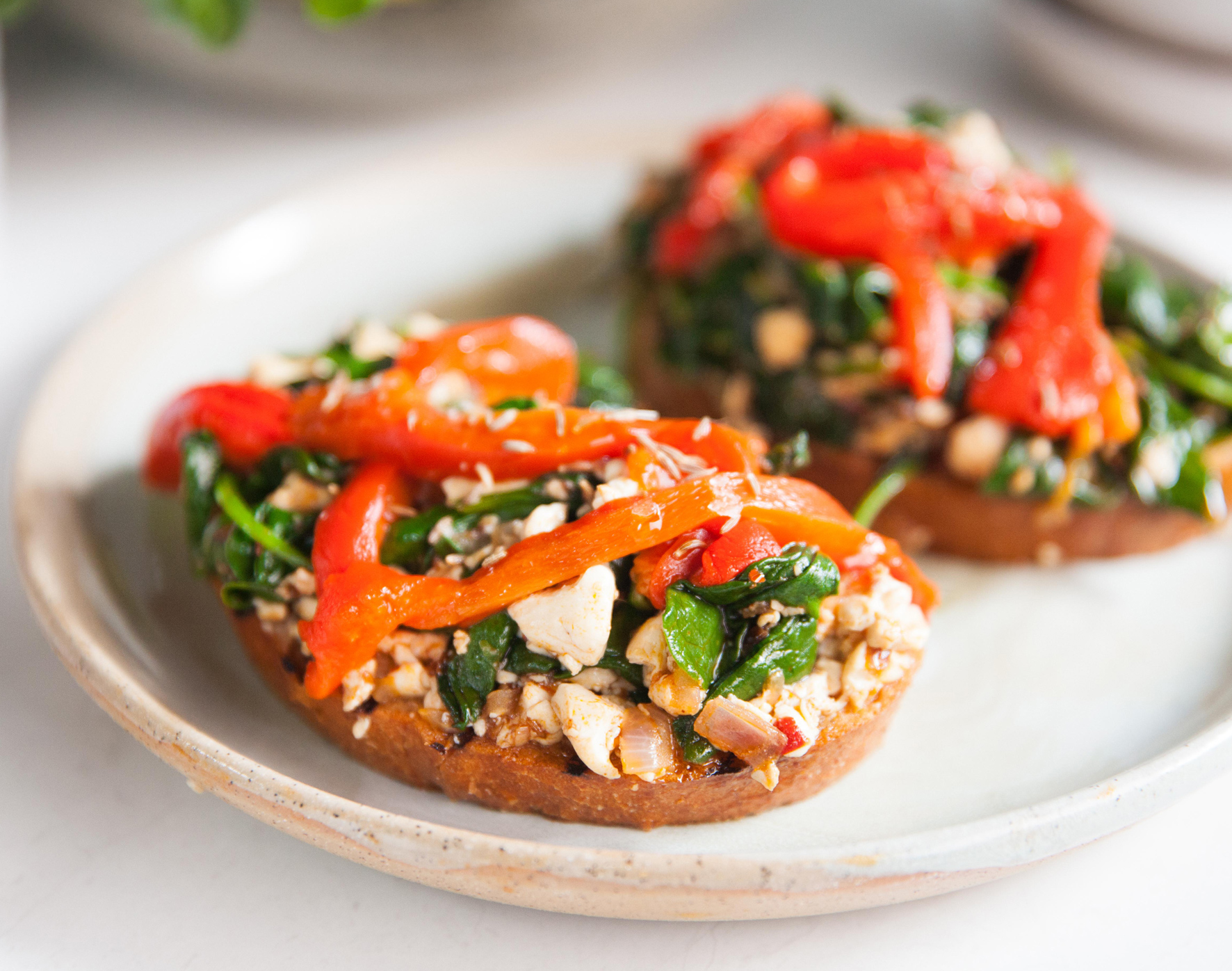 Rose Harissa Scramble with Baby Spinach on Toast