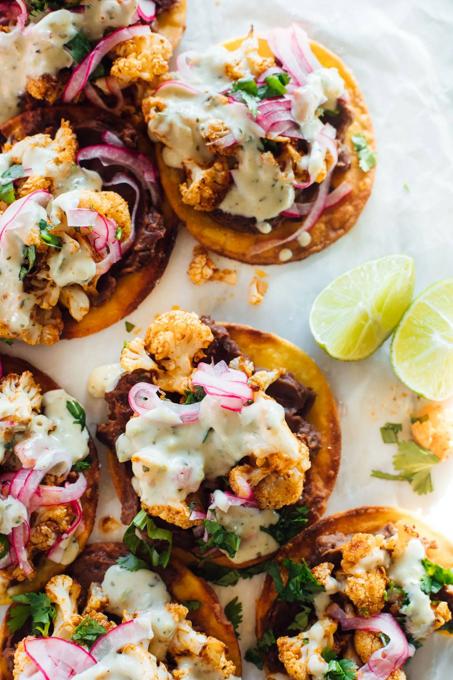 Cauliflower Black Bean Tostadas with Queso and Pickled Onion