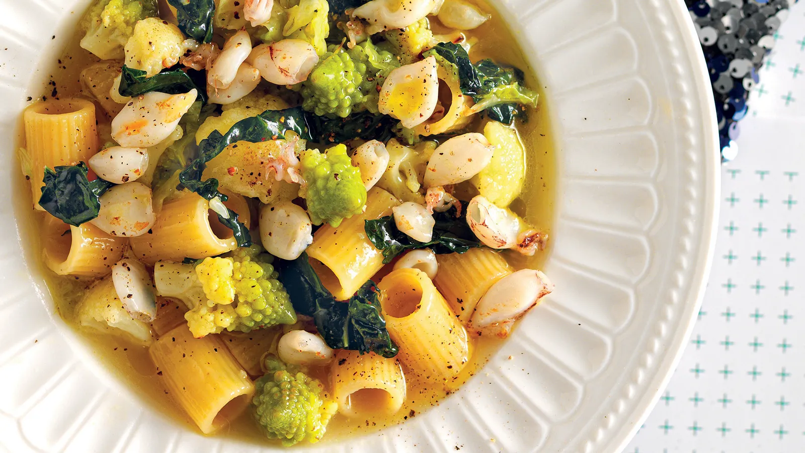 Mezze maniche all’acqua pazza d’inverno e calamaretti al salto